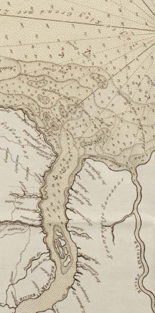 Part of an old chart with a river delta.